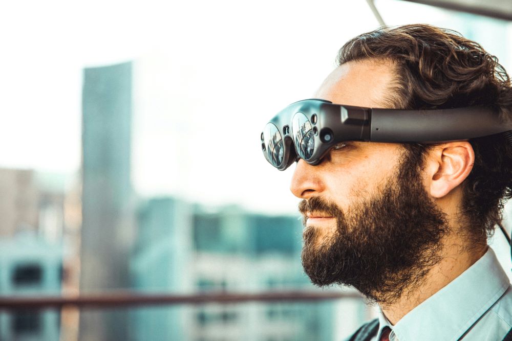 Man wears tech glasses. Man wears tech glasses.